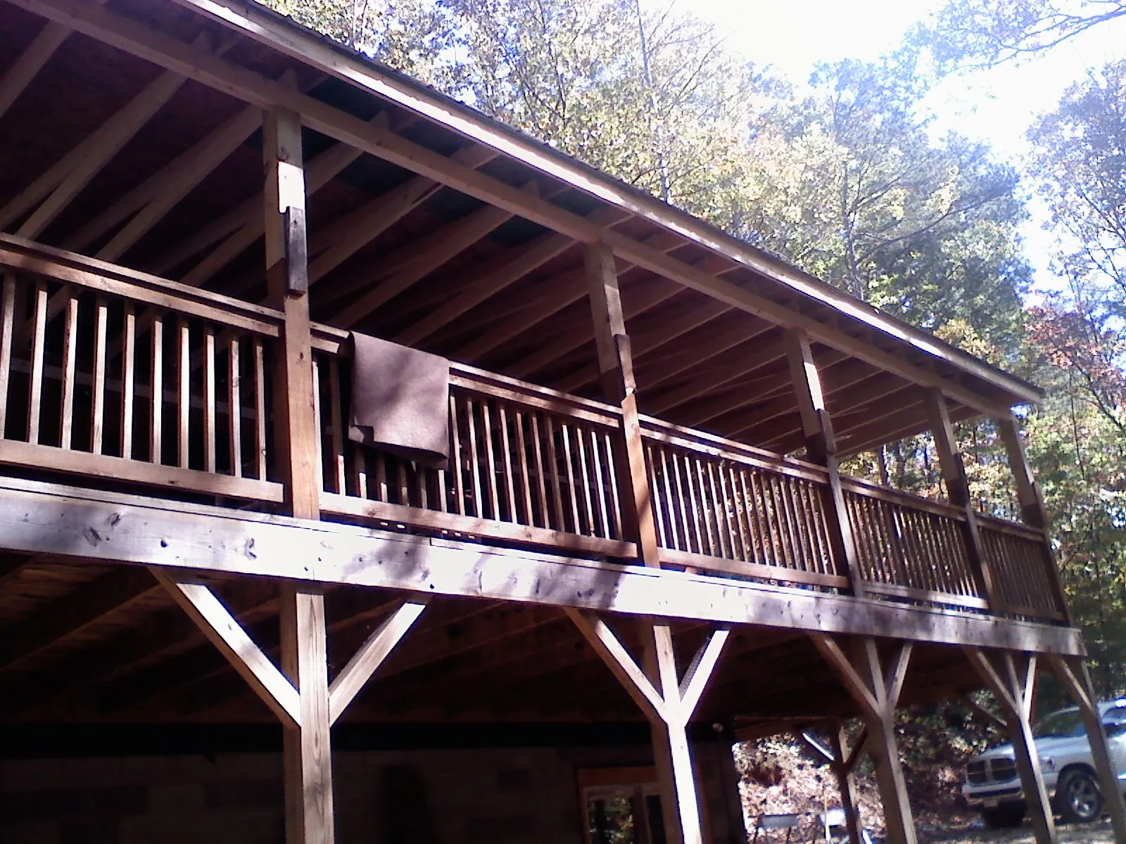 Timber framing under a new elevated porch and deck — Roof Leak Repair in Palmdale by Roofing Brothers